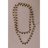 A pearl and tiger's eye beaded necklace, 44" long