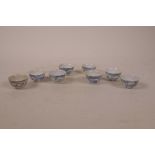 Eight antique Chinese blue and white porcelain tea bowls, each 2" diameter, A/F