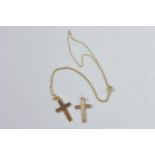 Two 9ct gold crosses, one with associated 16" chain, 4.5g gross