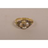 A Victorian unmarked gold, sapphire and pearl dress ring, size 'M', gross 2.2 grams
