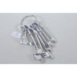 An ornamental bunch of large keys, longest 11"