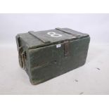 A vintage ammunition box with rope handles, 24" wide, 14" x 14"