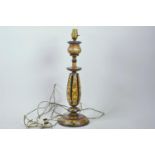An early C20th Kashmiri table lamp with turned wood body and hand painted decoration, and a