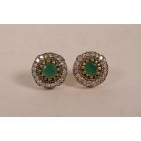 A pair of silver and cubic zirconium Renaissance style stud earrings