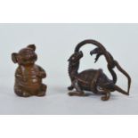 A Chinese bronzed metal figure of a tortoise entwined by a snake, and another of a pig, longest 2½"