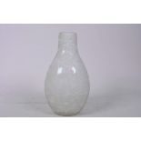A studio overlay glass vase with scroll decoration, 8½" high, A/F