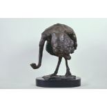 A bronze figure of an ostrich on an oval marble plinth, signed, 14" high