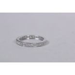 A 9ct white gold set diamond full eternity ring, approximately ½ct, size 'R'