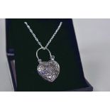 An engraved silver and malachite set, heart shaped padlock pendant on chain, pendant 1¼"