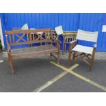 A hardwood garden bench, A/F, 48" long, and four folding campaign style chairs with canvas seats,
