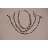 Three C19th white metal albert chains with T bars and clips, longest 13½"