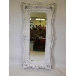 A painted composition wall mirror with swept frame, 36" x 72"