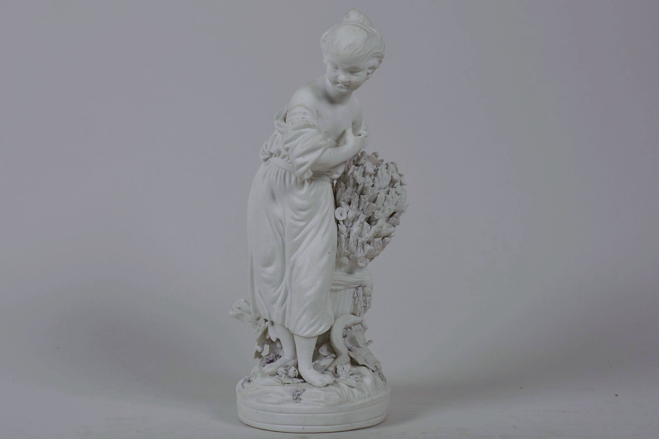 An C18th Derby biscuit porcelain figure 'No 123', taken from the set 'The French Seasons',