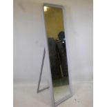 A painted frame mirror, with easel stand, 22" x 72"