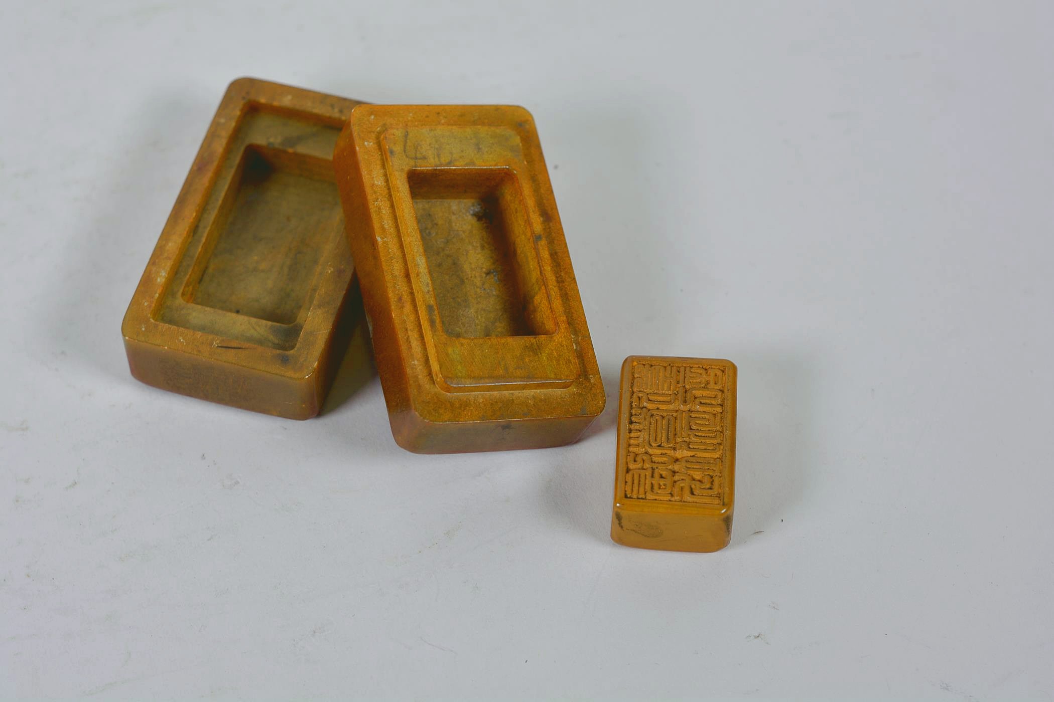 A Chinese amber soapstone box and seal with carved character inscription to lid and base, 3" x 1½" - Image 3 of 5