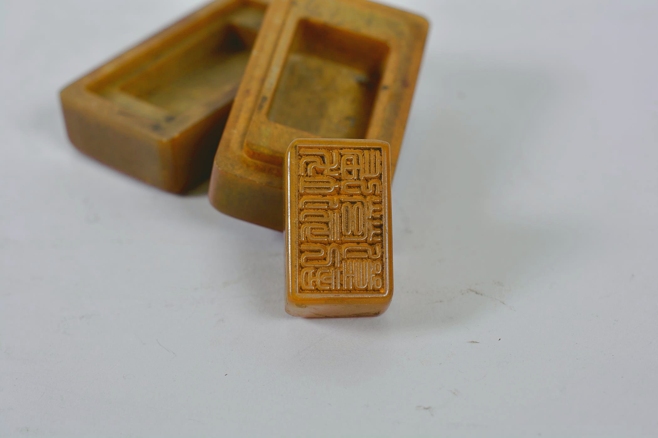 A Chinese amber soapstone box and seal with carved character inscription to lid and base, 3" x 1½" - Image 4 of 5