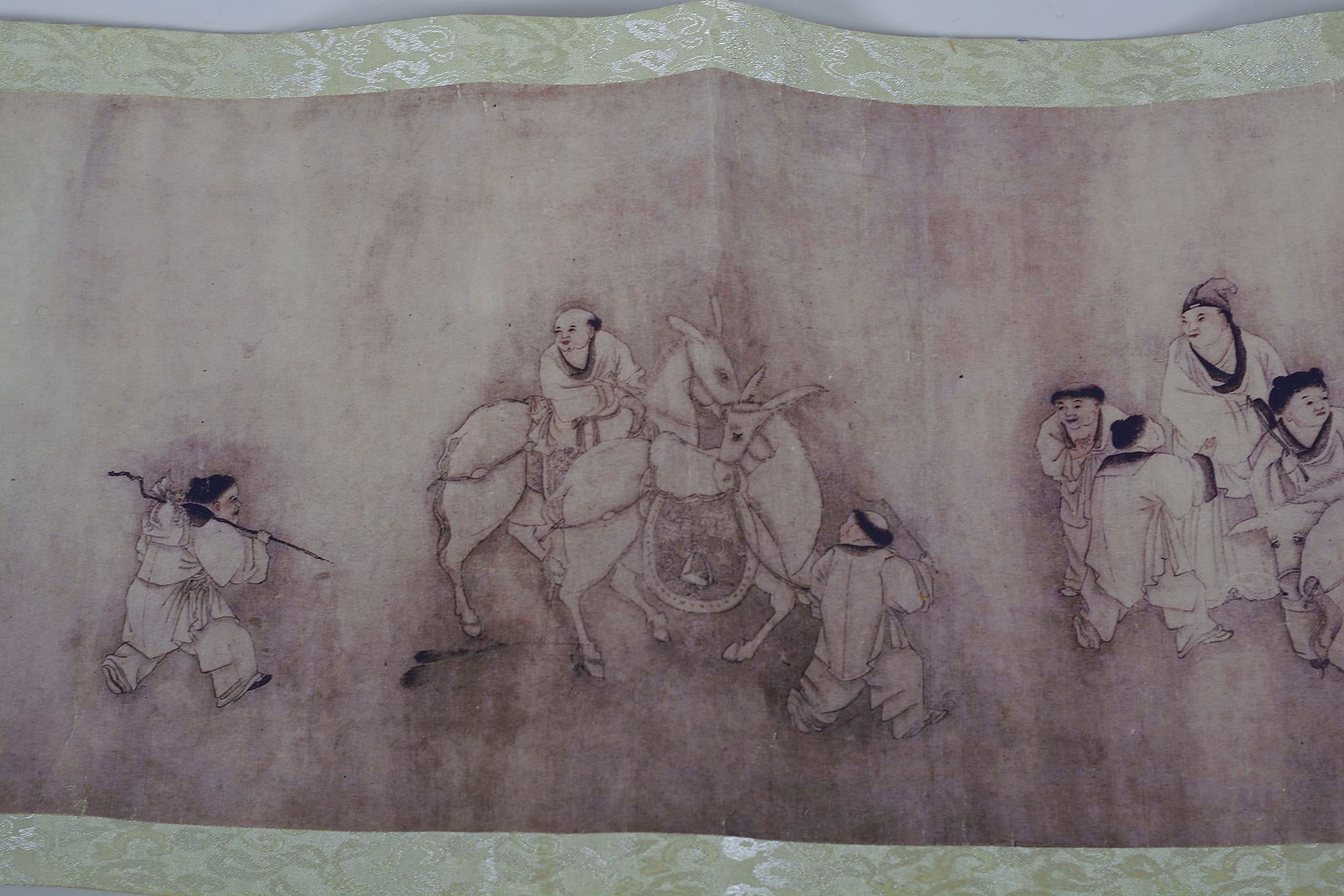 A Chinese printed scroll depicting an extensive scene with travelling figures, and two - Image 2 of 5