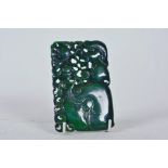 A Chinese spinach hardstone tablet with carved and pierced peach decoration, 4½" x 3"