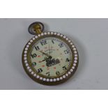 A reproduction brass cased pocket watch with pearl style decoration, 2" diameter
