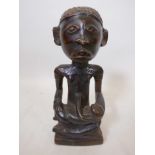 An African Congo maternity figure, hardwood, well carved, 14" high x 5" wide