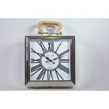 A large novelty chromed metal mantel clock, with wood carry handle, 14" x 14"