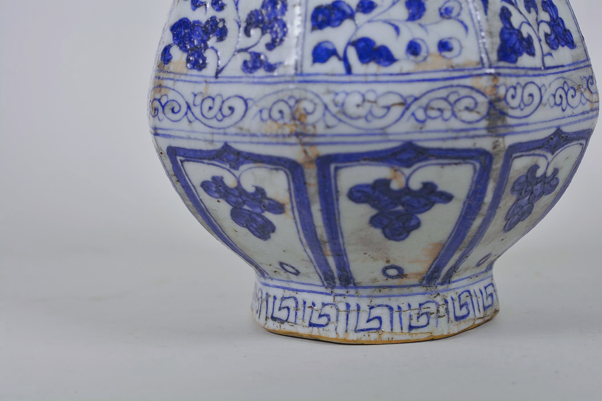 A Chinese Ming style blue and white pottery pear shaped vase decorated with flowers, 12" high - Image 4 of 5
