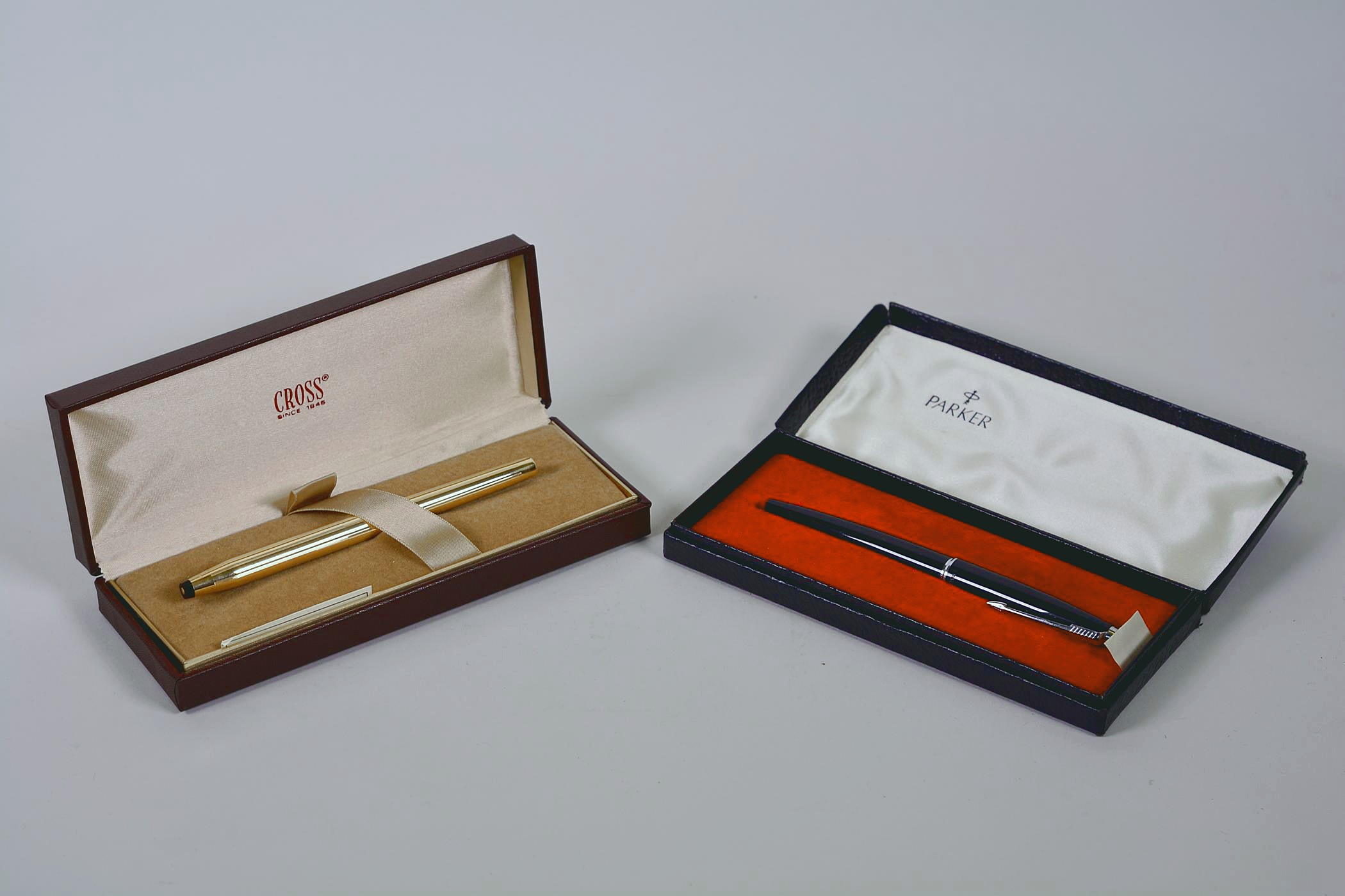 A Cross 14kt rolled gold fountain pen with 14kt gold medium nib, in its original case, along with