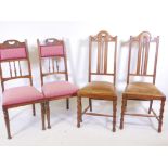 A pair of Gothic style high back dining chairs with drop in seats on bobbin turned supports,