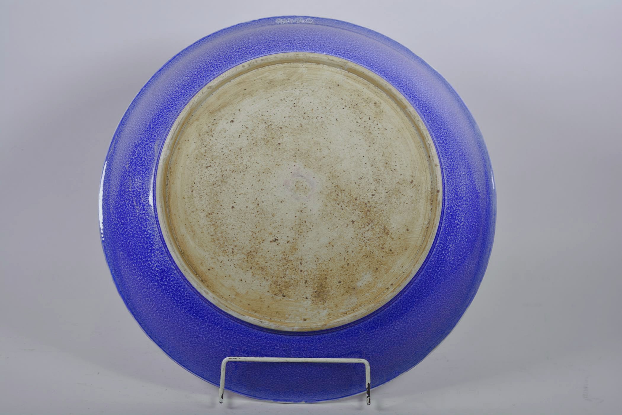 A large Chinese blue and white pottery charger with raised and incised floral decoration, incised - Image 2 of 4