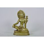 A bronze figurine of a Hindu deity, 7" high