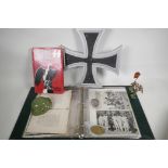 A collection of Third Reich memorabilia including photographs, 1936 Olympics etc, and military