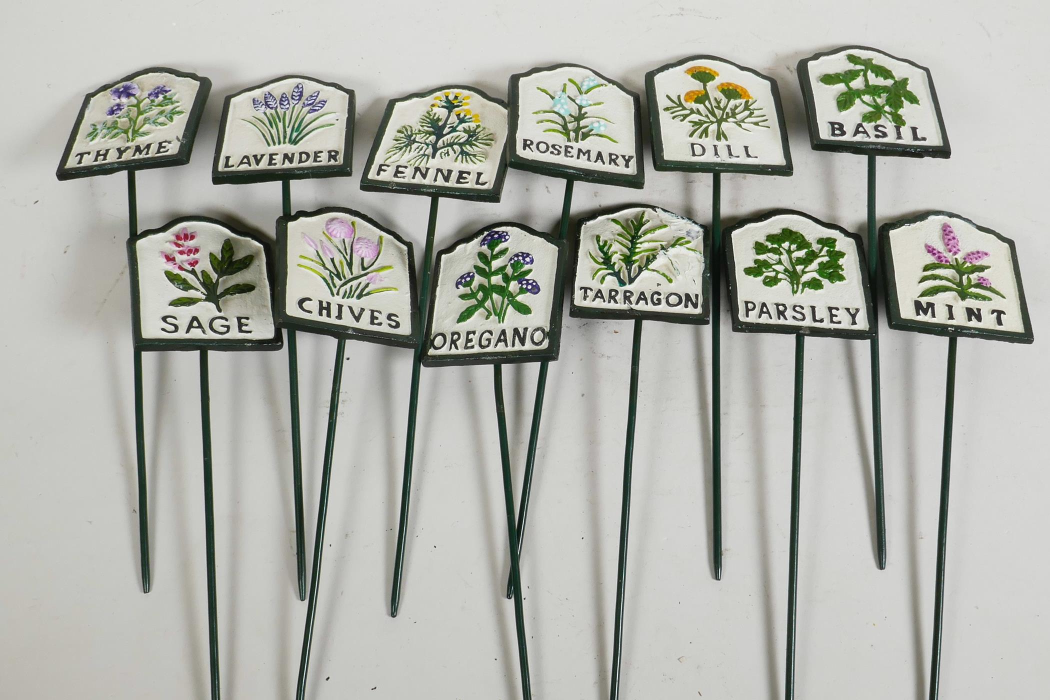 A set of twelve painted iron herb garden labels, 11½"