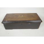 A Swiss musical box playing eight airs, in an inlaid case, 17" x 6½" x 5½", A/F