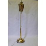 A brass standard lamp with lantern shade, early C20th, 74" high
