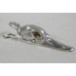 A silver plated clip in the form of a duck's head, 5" long