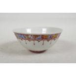 A Chinese Republic porcelain rice bowl decorated in the famille rose palette, character mark to