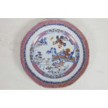 A C19th Chinese Imari plate painted with a lakeside garden, 9" diameter