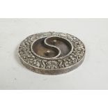 A Chinese white metal two section ink stone in the form of a yin yang symbol, impressed mark to