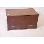 A C19th elm mule chest with two drawers and plank top, 36" x 20" x 17"