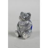 A novelty silver plated pin cushion in the form of a teddy bear, 1"