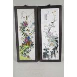 A pair of framed Chinese porcelain plaques, decorated with birds amongst flowering trees in bright