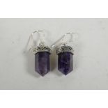 A pair of 925 silver and amethyst points
