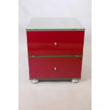 A 'Spectral' glass, enamel and acrylic media cabinet, with one drawer over a fall front cupboard,