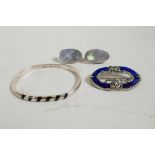 A Mexican silver and enamel bangle, with import marks, a pair of 925 silver oval earrings, and a