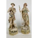 A pair of Royal Dux porcelain figures of boy and gilt goat herds, 15" high