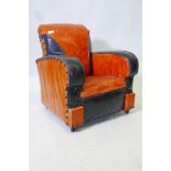 A child's bespoke leather club chair, 22" x 21" x 24"