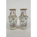 A pair of Canton famille rose porcelain vases painted with birds and flowers, A/F, 8" high