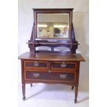 A Shapland & Petter walnut dressing table with banded decoration, original locks and copper handles,