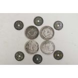 A small collection of Chinese facsimile (replica) coins of assorted denominations, largest 1½"