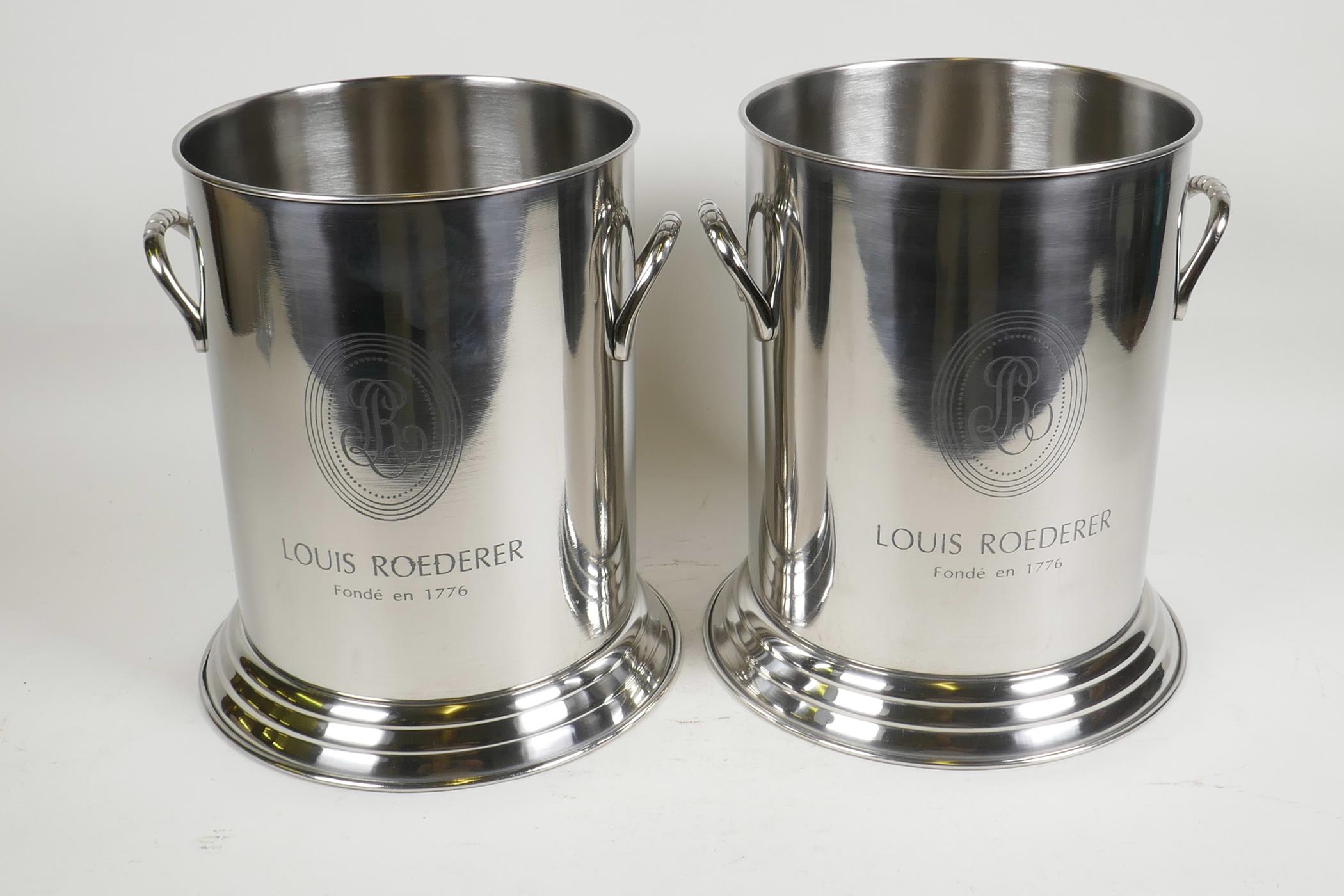 A pair of contemporary chrome plated champagne coolers with Louis Roederer decoration, 9½" high
